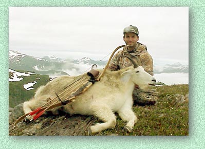 Pat LaFemme, editor of BowSite and his bow and arrow goat